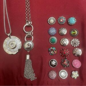 2 Necklaces each with 30” chains and interchangeable snaps.